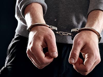 hands in hand cuffs